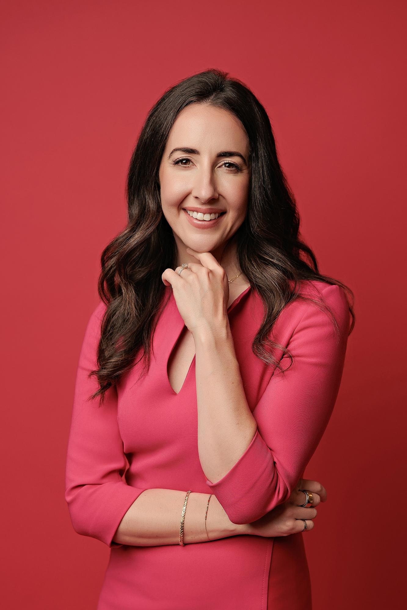 Calgary professional with camera-ready hair and makeup before a headshot session at Amanda Dams Headshots