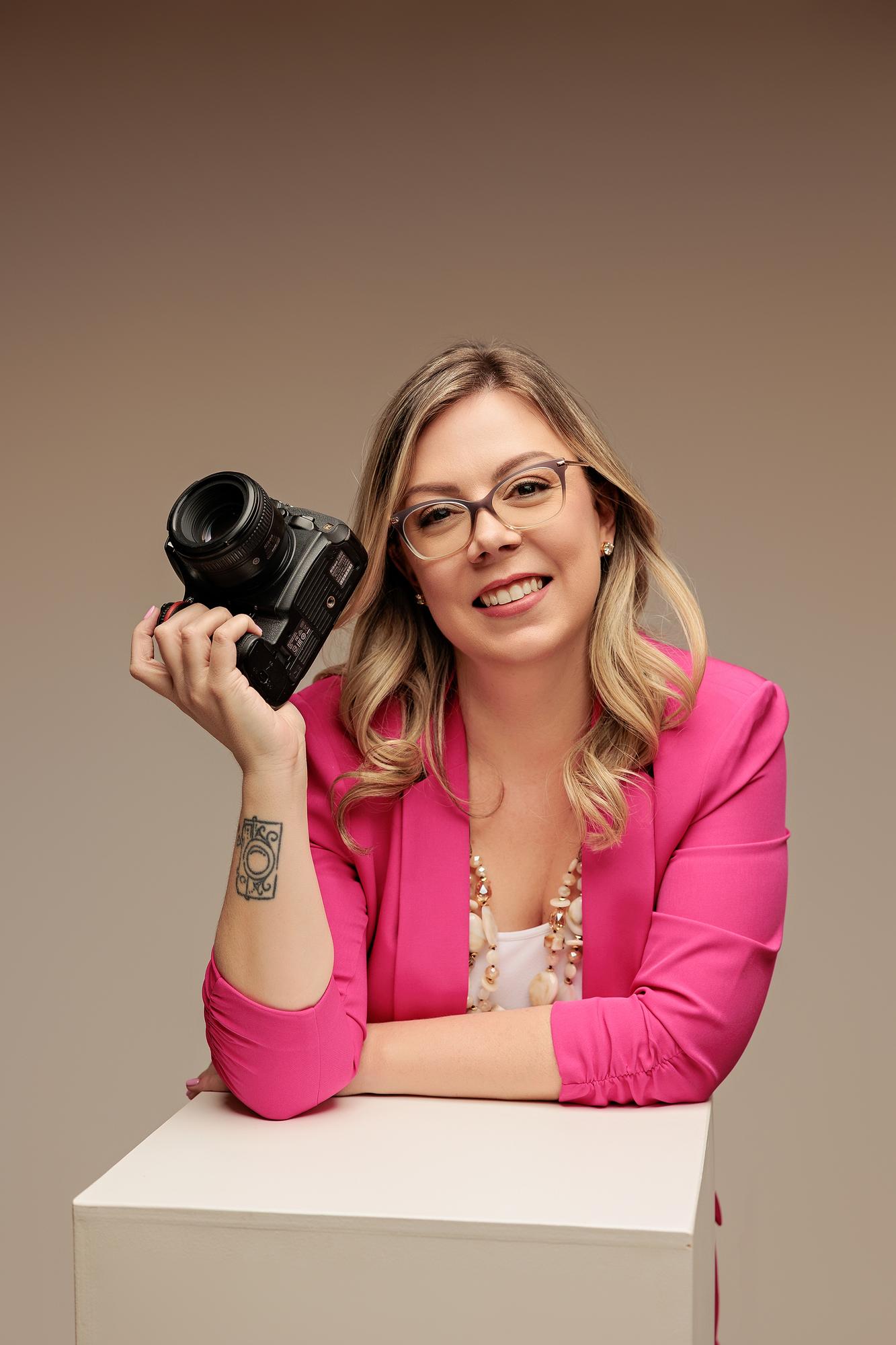 Amanda Dams, Calgary headshot photographer in her studio